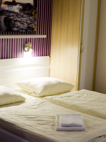 Die gemütlichen Hotelzimmer werden Sie begeistern.