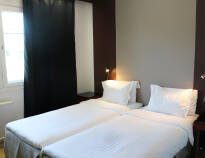 The hotel's rooms are bright with parquet floors and Hilding Anders beds.