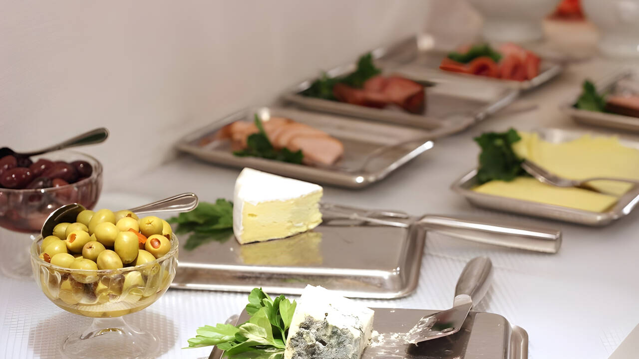 A large buffet breakfast with a wide selection of breads and cold cuts is served each morning.