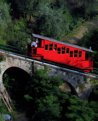 Take the old mountain railway up to the panoramic viewpoint and enjoy the view of the spa town with its parks.