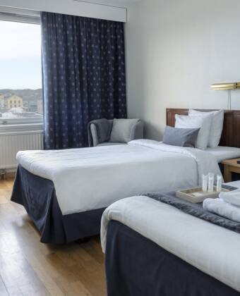 Här inkvarteras ni i ljusa och luftiga hotellrum.