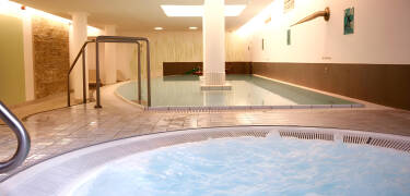 Unwind in the inviting wellness area with indoor pool, sauna and steam bath.