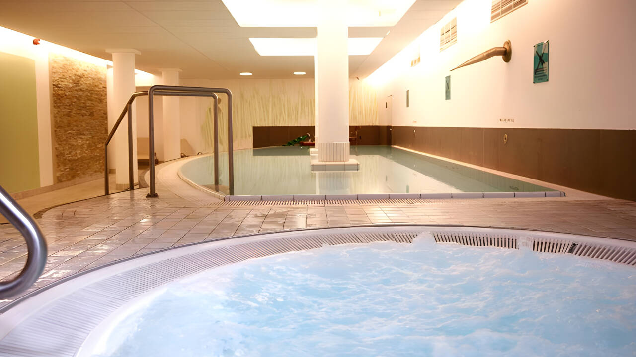 Unwind in the inviting wellness area with indoor pool, sauna and steam bath.