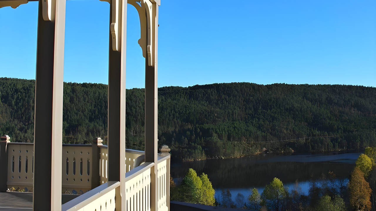 The hotel is surrounded by beautiful nature and the terrace overlooks the lake