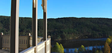 The hotel is surrounded by beautiful nature and the terrace overlooks the lake