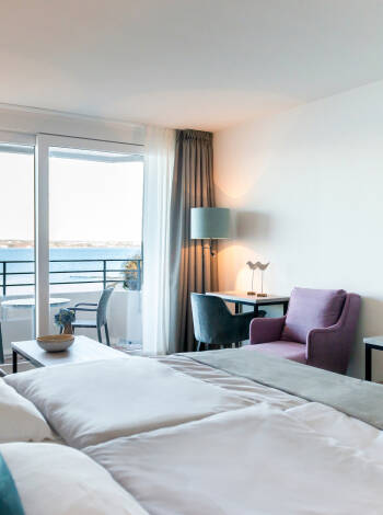 Stay in modern double rooms or apartments, some with breathtaking views of the Flensburg Fjord.