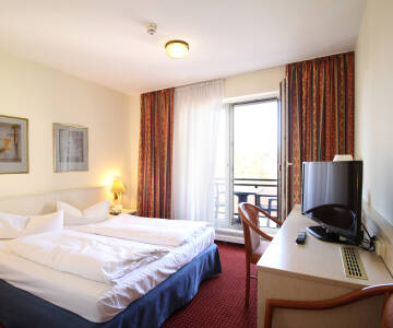 Slapp av i koselige rom designet for avslappende netter.