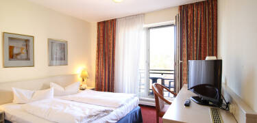 Slapp av i koselige rom designet for avslappende netter.