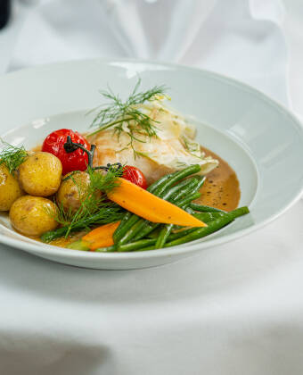 The hotel restaurant serves delicious dishes and boasts fantastic sea views.