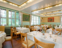 Dine in the rustic hotel restaurant, it's included in your package.
