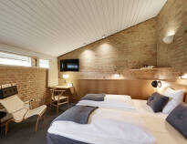 De komfortable værelser er holdt i et enkelt og ægte nordisk design.