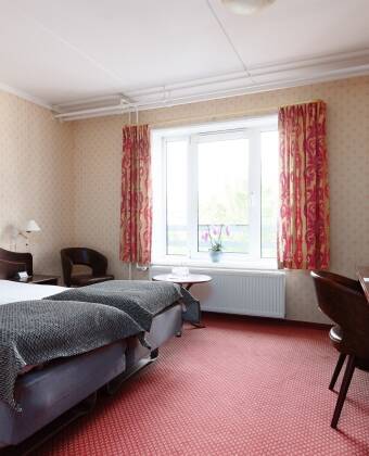 Hotellets moderne rom inviterer alle til en koselig atmosfære og danner et ideelt utgangspunkt for ferien.