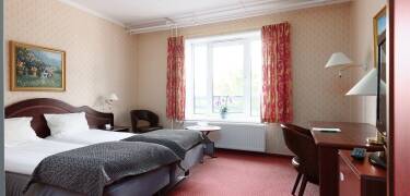 Hotellets moderne rom inviterer alle til en koselig atmosfære og danner et ideelt utgangspunkt for ferien.