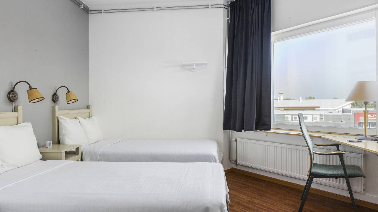 Komfortable rom gir et hyggelig sted å slappe av etter en dag med opplevelser eller sightseeing.