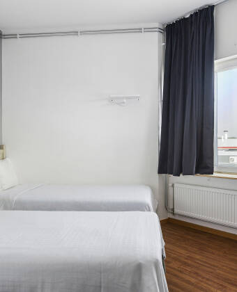Komfortable værelser skaber en behagelig ramme for afslapning efter en dag med oplevelser.
