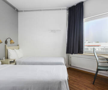 Komfortable værelser skaber en behagelig ramme for afslapning efter en dag med oplevelser.