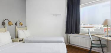 Komfortable værelser skaber en behagelig ramme for afslapning efter en dag med oplevelser.