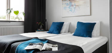 Hotellets lyse og komfortable værelser indbyder til afslapning og hygge