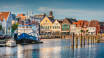 Besøg den charmerende havneby, Husum, som byder på masser af kulturelle oplevelser lige ud til Nordsøen.