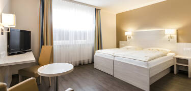 Choose from spacious hotel rooms or cosy holiday apartments.