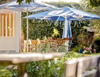 Relax with a drink in the conservatory or the cosy beer garden.