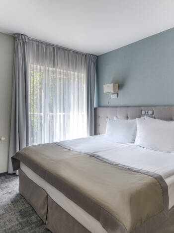 Modern rooms offer comfort and convenience with everything needed for a cozy stay.