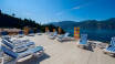 The hotel's large panoramic terrace is an ideal place to enjoy holiday life and a glorious view of Lake Garda