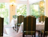 The hotel's attractive restaurant serves exquisite seasonal dishes based on regional cuisine