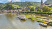 Go on a romantic boat trip on the Moselle River, which is surrounded by beautiful vineyards.