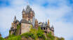 Missa inte att besöka och uppleva det imponerande gamla slottet Reichsburg Cochem under er semester.