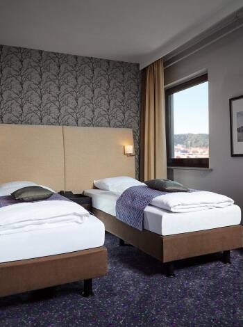 The pleasant rooms are equipped with comfortable beds and provide a good night's sleep.