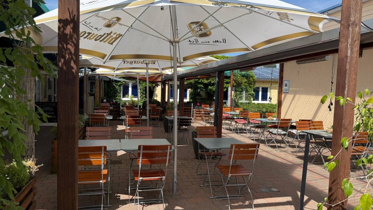 Relax on the hotel's pleasant terrace with a drink.