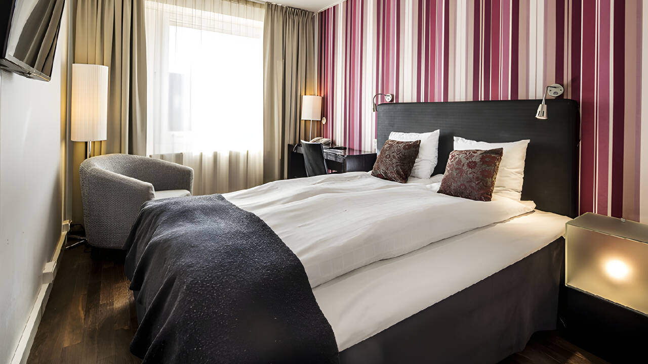 Hotellets indbydende værelser danner en behagelig ramme om Jeres ophold.