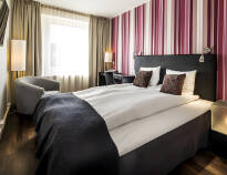 The hotel's welcoming rooms provide a comfortable setting for your stay.