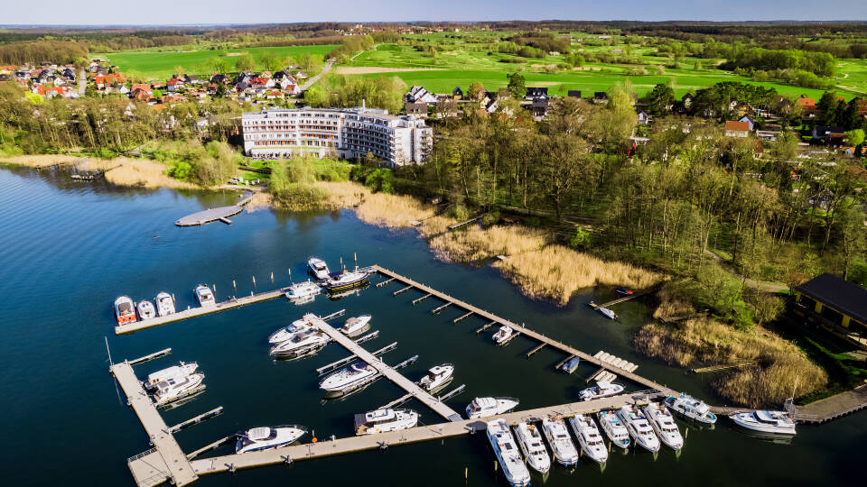 In the heart of the beautiful Mecklenburg Lake District, Seehotel Fleesensee has its own bathing island and offers free parasols and loungers.