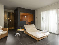 The impressive wellness area with sauna, pool and spa treatments offers relaxation for body and mind.