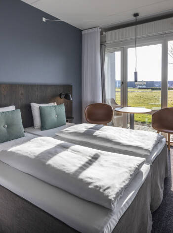 Stay in beautiful, bright rooms that have been recently renovated and all have a terrace or balcony
