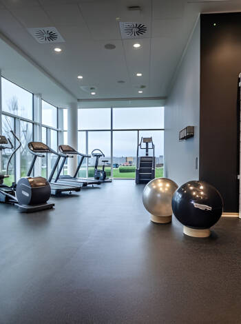 Stay on top of your fitness routine in the modern hotel gym.