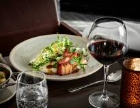 Have a good dinner in the hotel restaurant and enjoy a glass of wine in lovely surroundings.