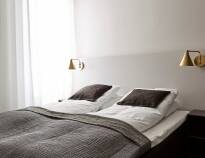 Die schöne Zimmer sind im modernen nordischen Stil und bieten Ihnen einen hohen Komfort!