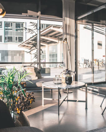 Embrace the elegance of Scandinavian design through the hotel's stylish bar and common areas