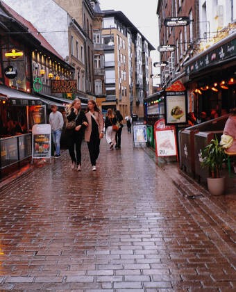Just a short walk away, immerse yourself in the lively ambience of Aalborg's bustling pedestrian streets