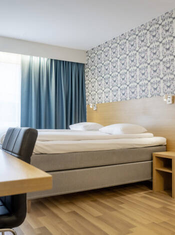 In einem der geräumigen Zimmer werden Sie sich wie zu Hause fühlen.