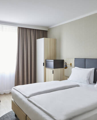Nyt det komfortable rommet ditt frem til kl. 13.00 på avreisedagen (sen utsjekking).