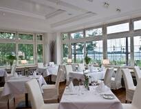 Have dinner in the hotel restaurant with a beautiful view of Lake Dieksee.