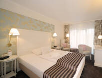 The stylishly decorated rooms offer relaxation and cosy moments in tasteful surroundings.