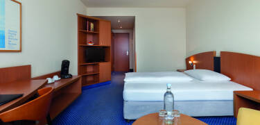 The rooms are spacious and comfortably furnished.