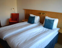Hotellrummen är praktiska och enkla men trevliga och bekvämt inredda.