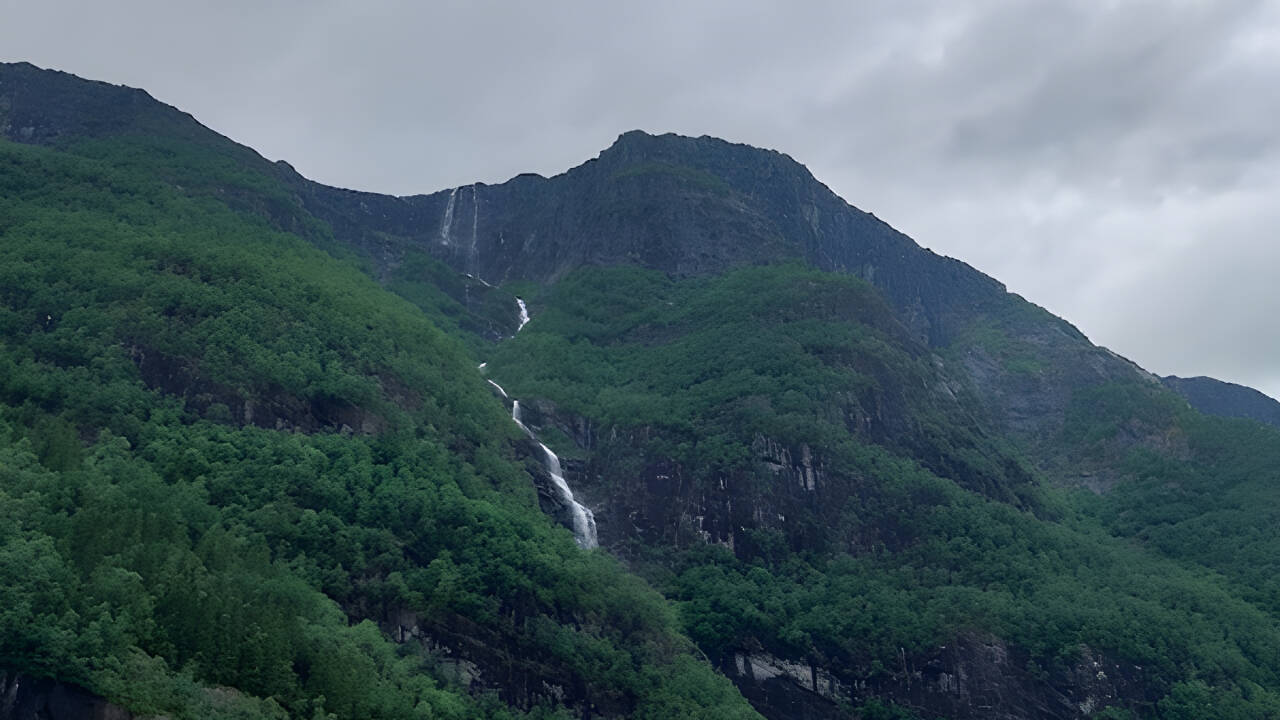 Visit the Tvinde fossen waterfall and experience a real waterfall up close!