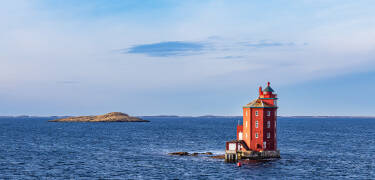 Machen Sie eine Bootstour zu einem der berühmtesten Wahrzeichen Ørlands: dem Leuchtturm Kjeungskjær.